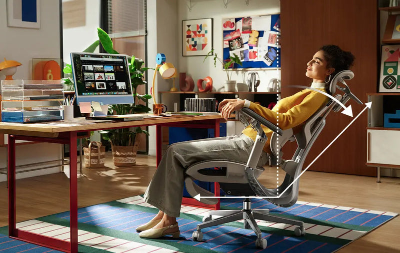 Smaller-framed woman reclining in the HBADA E3 Pro