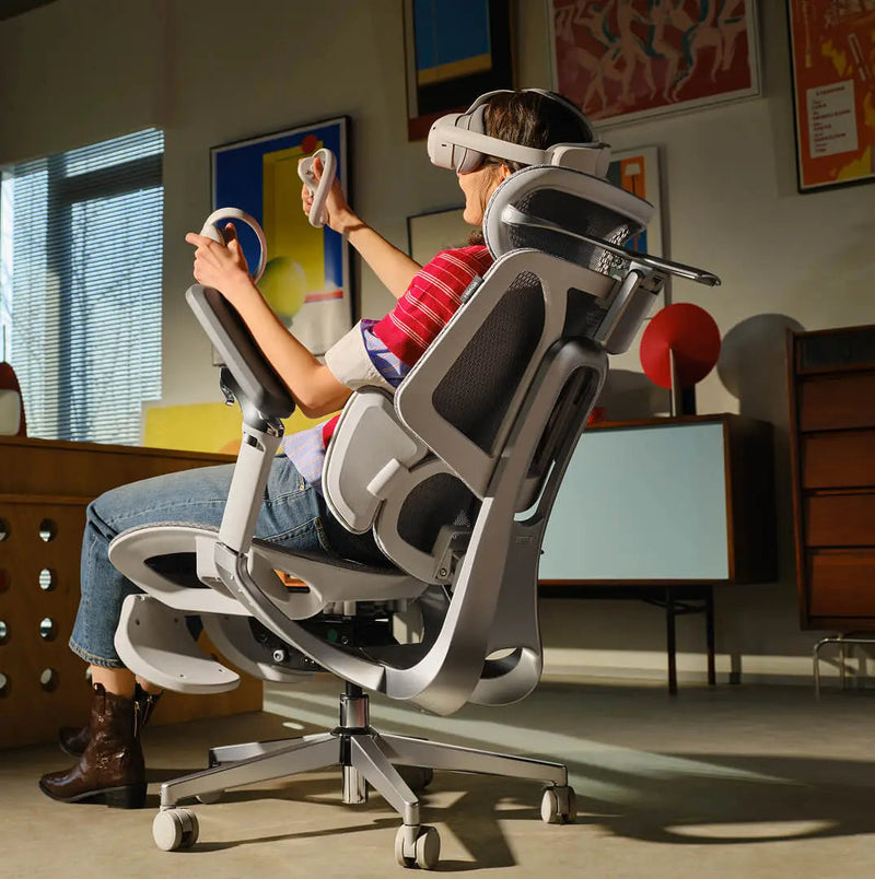 VR gamer reclined to 130 degrees in the HBADA E3 Pro