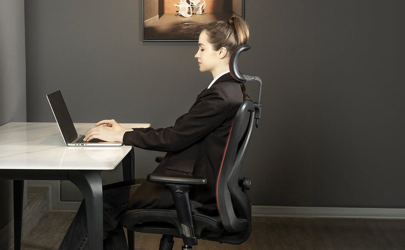 Sitting upright at a desk in the Sihoo M57