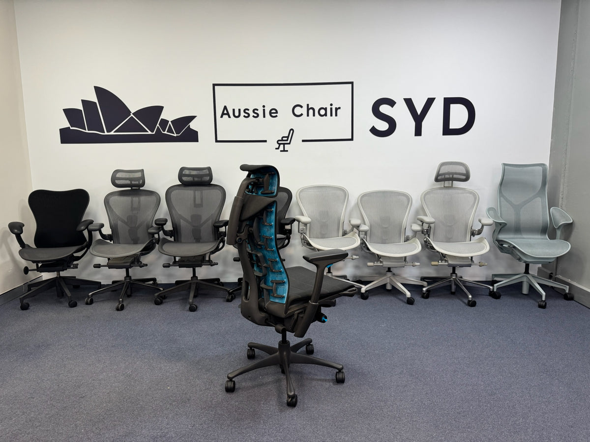 Herman Miller Embody Gaming Chair in Black & Cyan – rear three-quarter view in Aussie Chair Sydney showroom