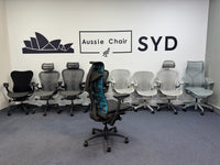 Herman Miller Embody Gaming Chair in Black & Cyan – rear three-quarter view in Aussie Chair Sydney showroom