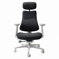 CloudSoft 4-Piece Chair Cover Set in Black – fitted to LiberNovo Omni chair, front three-quarter view