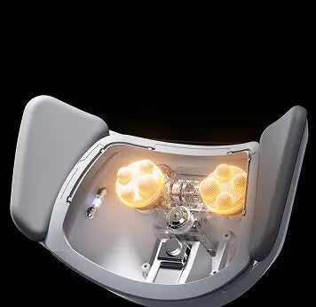 HBADA X7 lumbar unit opened up to show its two glowing 8D bionic massage heads
