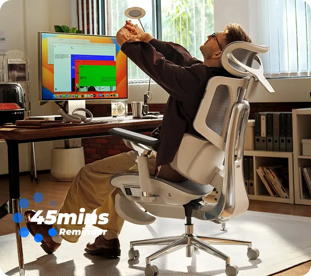 Man stretching back in the HBADA X7 at his desk, with HBADA's 45-minute reminder graphic
