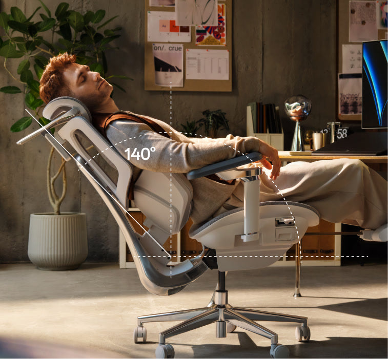 Man napping in the HBADA X7 at its full 140° recline with the footrest out