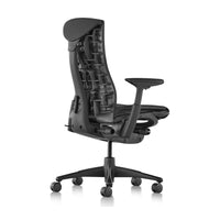 Herman Miller Embody Chair in Black with Graphite frame and base – rear three-quarter view, studio