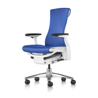 Herman Miller Embody Chair in Blue with White frame – front three-quarter view, studio
