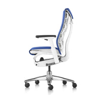 Herman Miller Embody Chair in Blue with White frame – side profile, studio