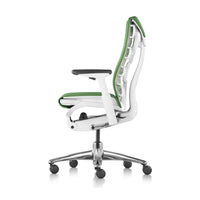 Herman Miller Embody Chair in Grass Green with White frame – side profile, studio