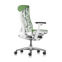 Herman Miller Embody Chair in Grass Green with White frame – rear three-quarter view, studio