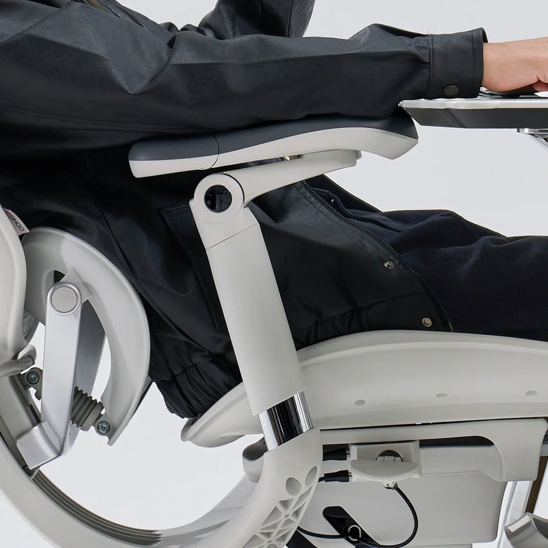 Armrests tilted down while reclined