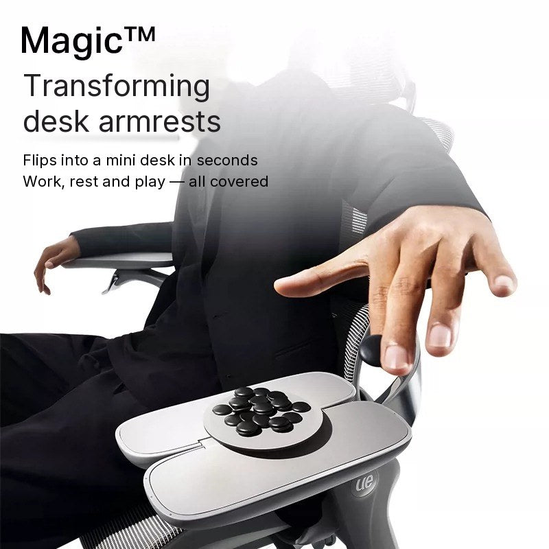UE FLOW 660 Pro Magic armrest folded out as a small desk under a user's hand